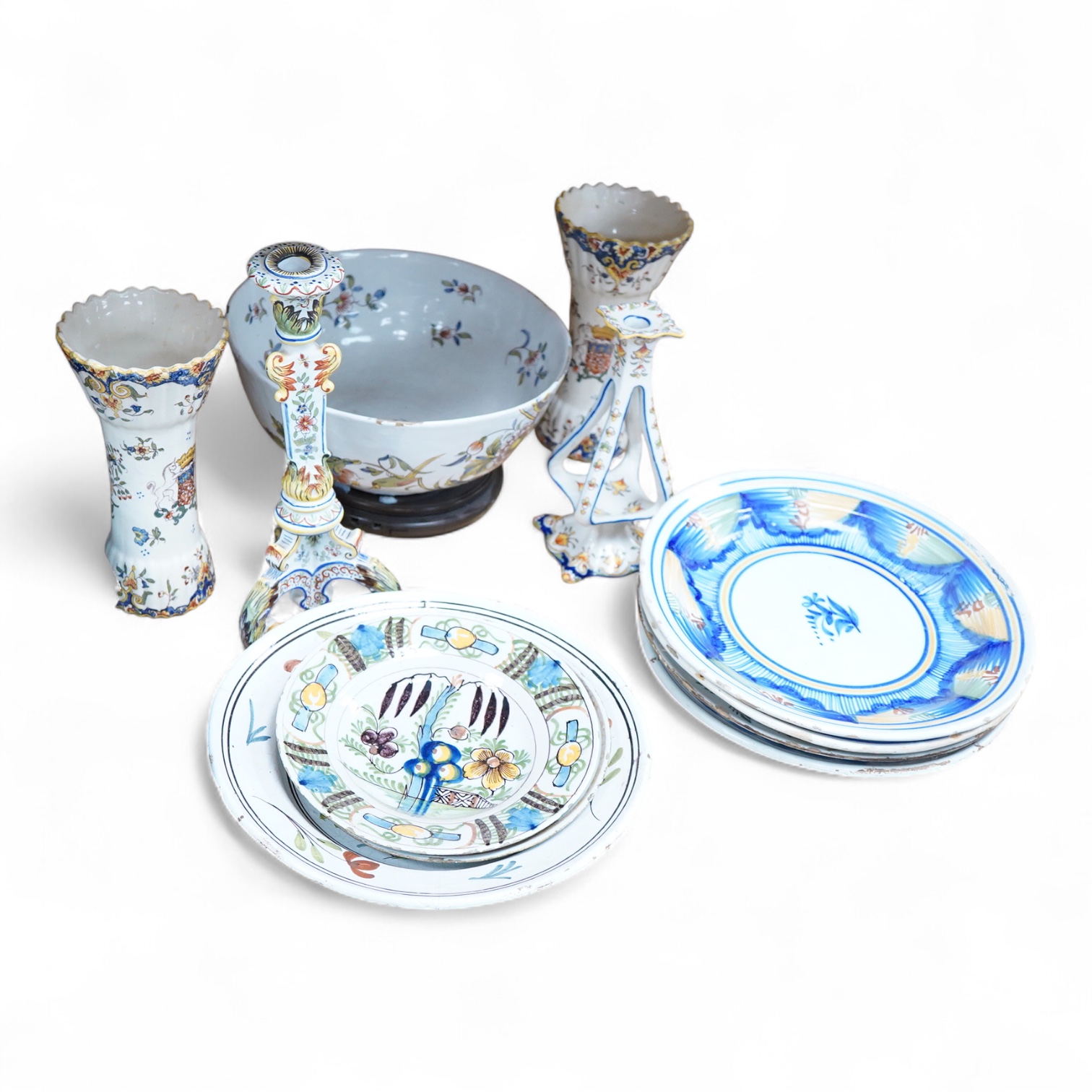18th and 19th century faience including five chargers and large bowl, latter 30cm